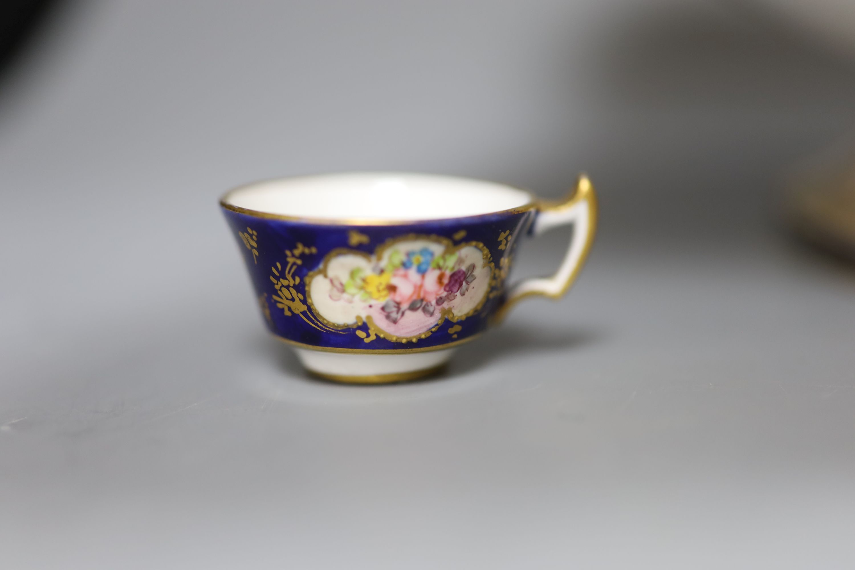 A Royal Crown Derby dish, a vase and a cup, tallest 30cm (all a.f.)